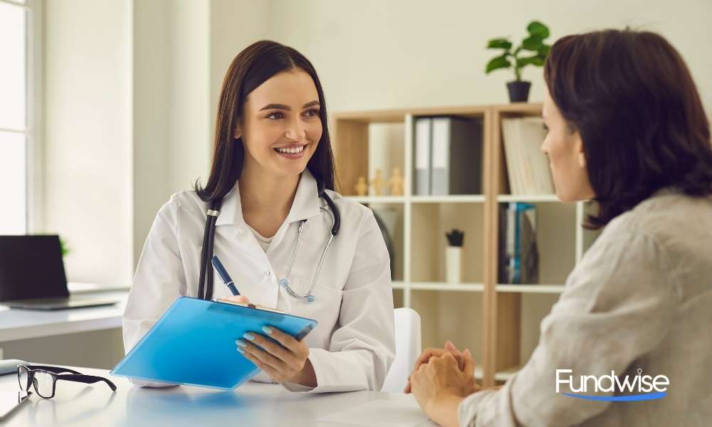 female medical doctor consulting patient in the clinic. health insurance concept.