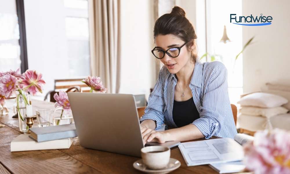 female employee working from home on her laptop