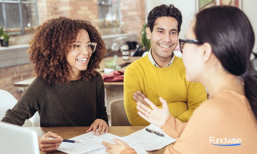 business owners discussing with a loan broker