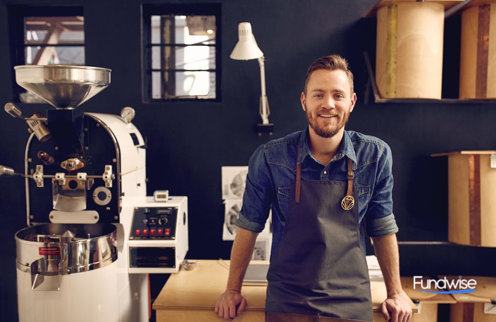 business owner in his modern coffee roastery and distribution spa