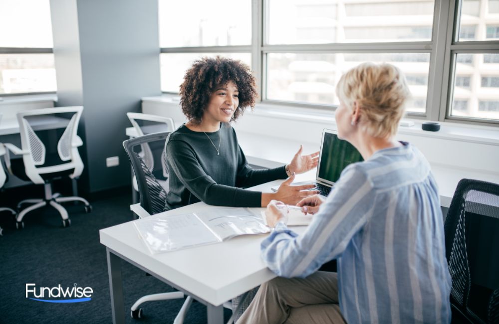 business woman talking to a finance specialist